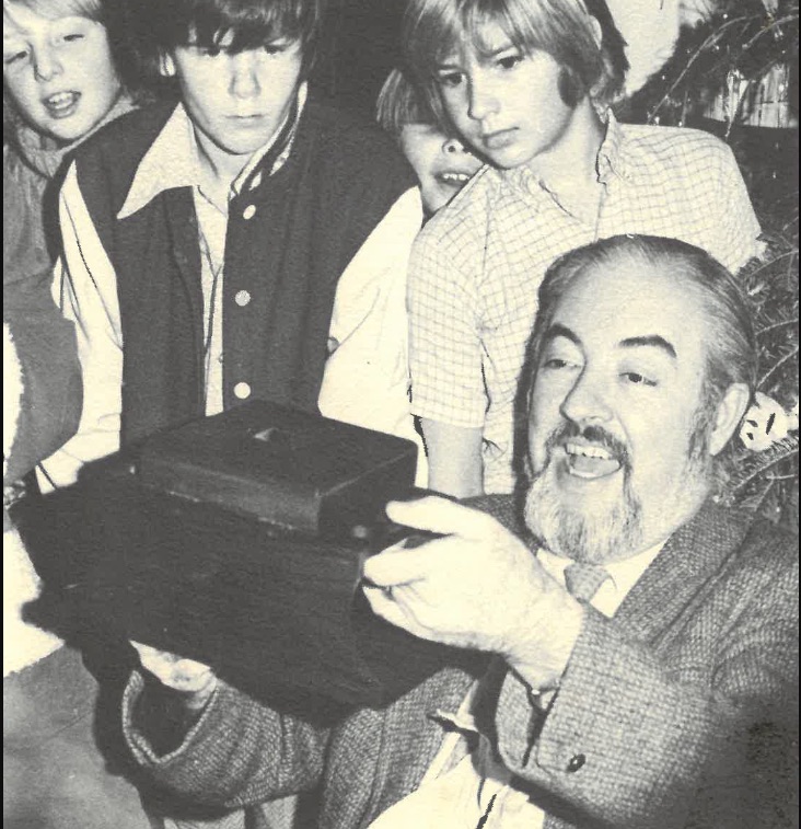 Charles Drake with students