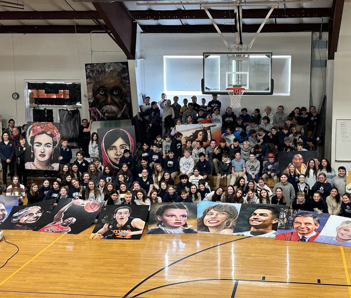 Landmark Middle School students pose with Rob Surette