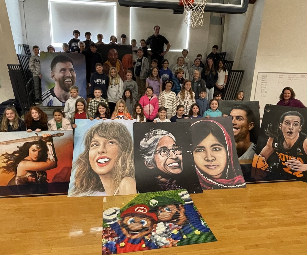 Landmark Elementary students pose with Rob Surette