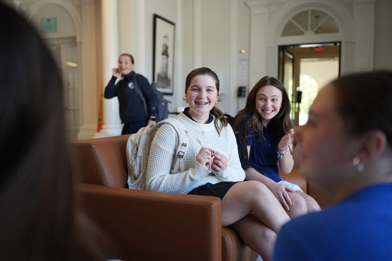 girls laughing in lounge