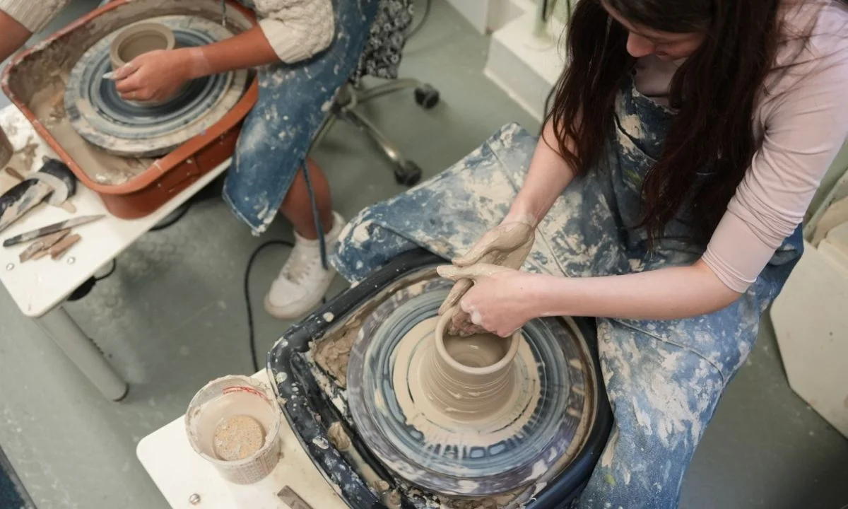 girl at ceramic wheel