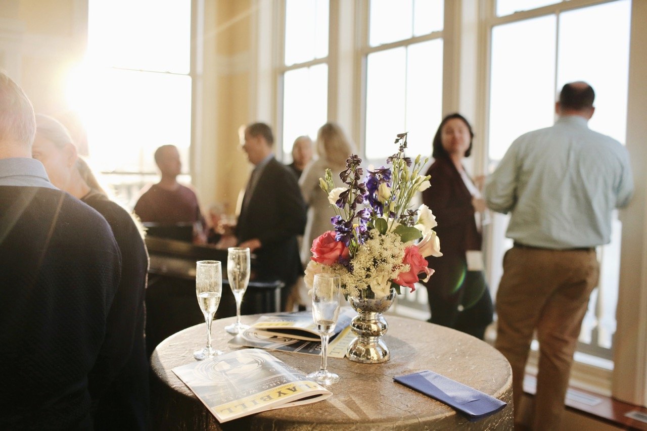 people laughing at fundraiser