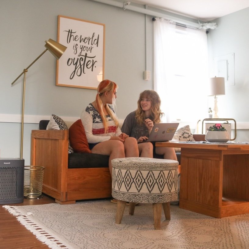 female students in dorm common room