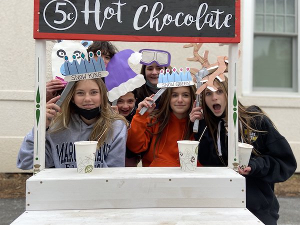 students in photo booth landmark school